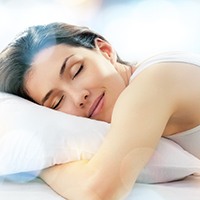 Woman sleeping without being interrupted by sleep apnea