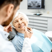 Woman during dental checkup in Owing Mills