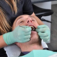 Man receiving dental treatment