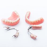 two full dentures and two partials 