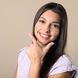 Young woman happy with her tooth-colored fillings in Owings Mills 