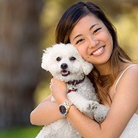 Young woman with beautiful smile outdoors