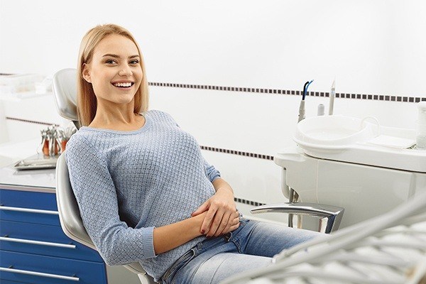 woman sitting in dental chair