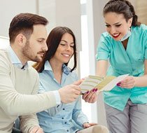 dental staff talking to patient