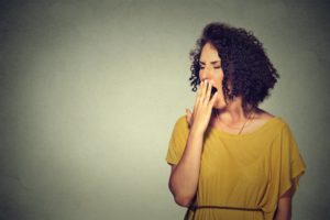 a woman yawning