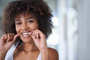 woman flossing