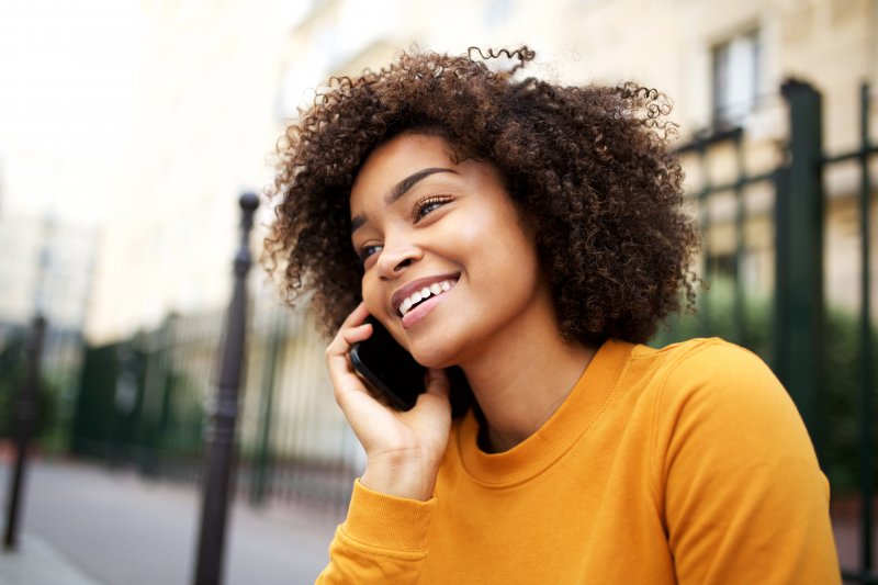 Woman speaking with Invisalign