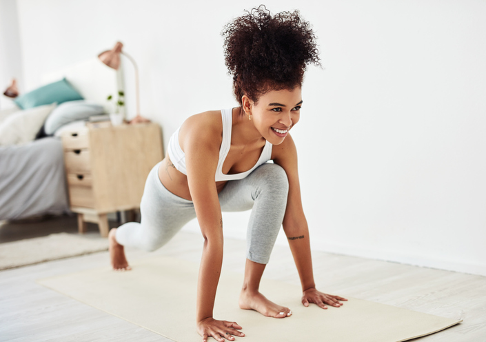 person smiling while working out