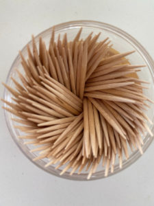Cup full of toothpicks